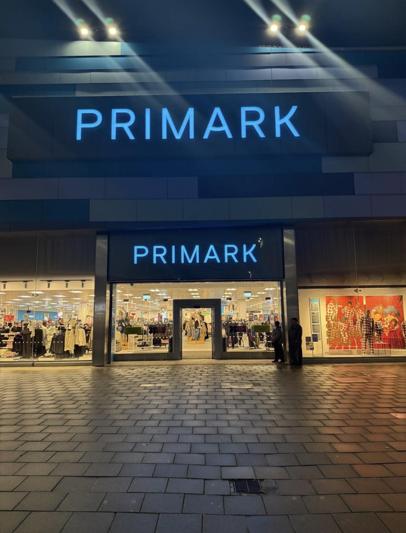 Large retail frontage at night after commercial works